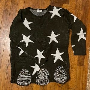 Distressed green star sweater